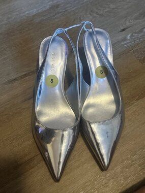 Nine West silver heels